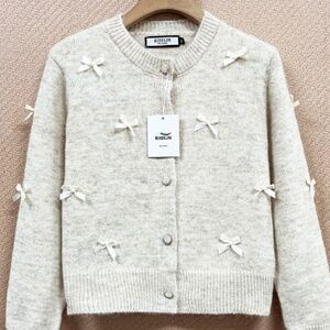 Elegant European made Cardigan 80% wool